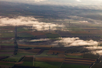 Minfeld wind farm in the morning mist in Kandel in the state Rhineland-Palatinate, Germany