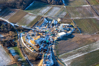 Aerial photograpy of Construction site of the tunnel portal east for the Astrid Tunnel for the underpass and bypass of Bad Bergzabern between B38 (Weinstraße) and B427 (Kurtalstraße) in winter with snow in Dörrenbach in the state Rhineland-Palatinate, Germany