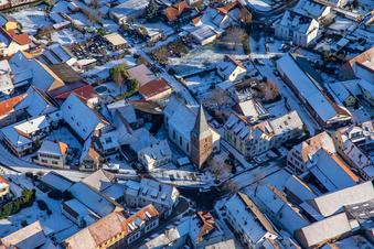 Protestant church in winter with snow in the district Schweigen in Schweigen-Rechtenbach in the state Rhineland-Palatinate, Germany