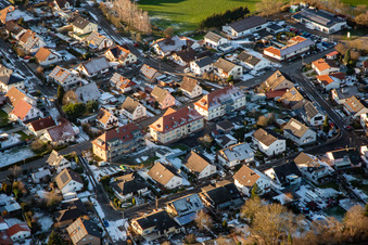 Aerial view of Steinweilerer Straße in winter with snow in Winden in the state Rhineland-Palatinate, Germany