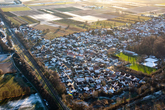 Steinweilerer Straße in winter with snow from the northeast in Winden in the state Rhineland-Palatinate, Germany