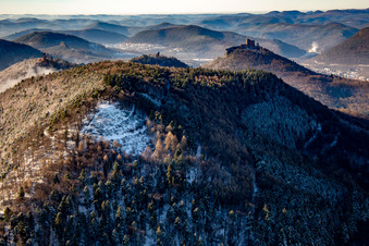 Trifels Castle, Anebos and Scharfenberg castle ruins behind the Förlenberg paragliding launch site in winter with snow in Leinsweiler in the state Rhineland-Palatinate, Germany