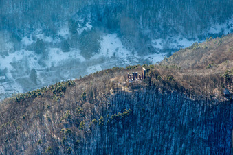 Ramburg castle ruins in winter with snow in Ramberg in the state Rhineland-Palatinate, Germany