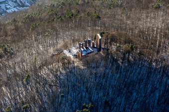 Aerial view of Ramburg castle ruins in winter with snow in Ramberg in the state Rhineland-Palatinate, Germany