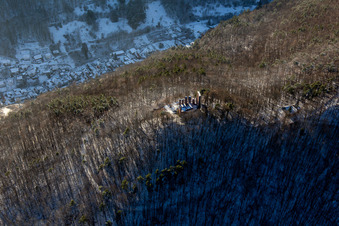 Aerial photograpy of Ramburg castle ruins in winter with snow in Ramberg in the state Rhineland-Palatinate, Germany