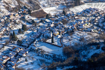 Church in winter with snow in Dernbach in the state Rhineland-Palatinate, Germany