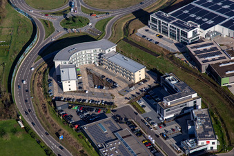 Aerial view of Office building at the roundabout to the A65 LD Mitte motorway exit in the district Queichheim in Landau in der Pfalz in the state Rhineland-Palatinate, Germany