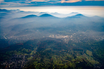 Evening mist over the Odenwald in Gaggenau in the state Baden-Wuerttemberg, Germany