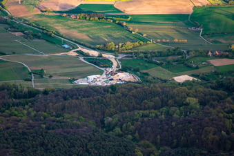 Construction site of the eastern tunnel portal for the Astrid Tunnel for the underpass and bypass of Bad Bergzabern between B38 (Weinstraße) and B427 (Kurtalstraße) in Dörrenbach in the state Rhineland-Palatinate, Germany seen from above
