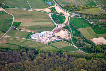 Construction site of the eastern tunnel portal for the Astrid Tunnel for the underpass and bypass of Bad Bergzabern between B38 (Weinstraße) and B427 (Kurtalstraße) in Dörrenbach in the state Rhineland-Palatinate, Germany from the plane