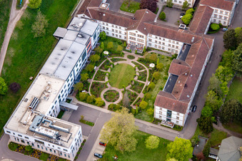 Aerial view of Palatinate Hospital for Psychiatry and Neurology "Landeck" with Department of General Psychiatry and Addiction Disorders – Clinic for Psychiatry, Psychosomatics and Psychotherapy, Clinic for Forensic Psychiatry, Clinic for Gerontopsychiatry, Psychosomatics and Psychotherapy, Clinic for Neurology, Clinic for Psychiatry, Psychosomatics and Psychotherapy, Clinic for Child and Adolescent Psychiatry, Psychosomatics and Psychotherapy as well as Institute Outpatient Clinic, Psychiatric Institute Outpatient Clinics – Clinic for Psychiatry, Psychosomatics and Psychotherapy in Klingenmünster in the state Rhineland-Palatinate, Germany