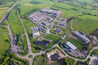 Aerial view of Industrial estate with KIMMEL LOGISTICS, KIMMEL LAVAGE, Dietrich Véhicules and Sarre Union Pl Services - MAN at the Sarre-Union toll station - A4 - Route No. 42 in Thal-Drulingen in the state Bas-Rhin, France