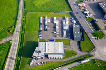 Oblique view of Industrial estate with KIMMEL LOGISTICS, KIMMEL LAVAGE, Dietrich Véhicules and Sarre Union Pl Services - MAN at the Sarre-Union toll station - A4 - Route No. 42 in Thal-Drulingen in the state Bas-Rhin, France