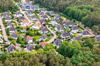 Thatched roof settlement of the holiday apartment Dünenresidenz from the north in Peenemünde in the state Mecklenburg-Western Pomerania, Germany