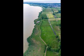 Dike and drainage canals on the banks of the Achterwasser in Loddin in the state Mecklenburg-Western Pomerania, Germany