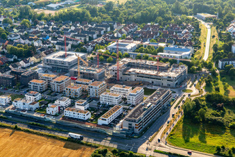 Multi-family house construction site "New City Centre" from the east in the district Mörsch in Rheinstetten in the state Baden-Wuerttemberg, Germany