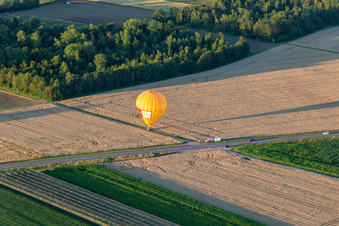 Landing of two hot air balloons "Pfalzgas in Winden in the state Rhineland-Palatinate, Germany