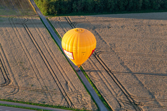 Aerial photograpy of Landing of two hot air balloons "Pfalzgas in Winden in the state Rhineland-Palatinate, Germany
