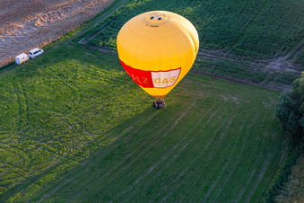 Landing of two hot air balloons "Pfalzgas in Winden in the state Rhineland-Palatinate, Germany from the plane