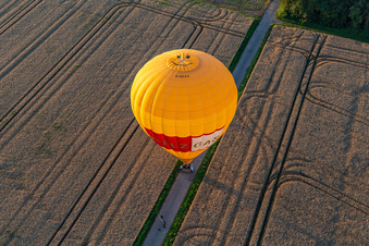 Drone recording of Landing of two hot air balloons "Pfalzgas in Winden in the state Rhineland-Palatinate, Germany