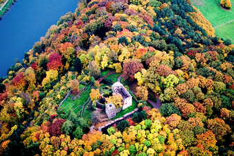 Ruins and remains of the walls of the former Minneburg castle in the autumn forest above the Neckar in the district Neckarkatzenbach in Neunkirchen in the state Baden-Wuerttemberg, Germany