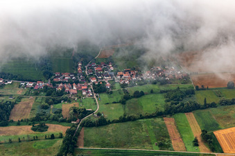 Village from the north under low clouds in Hergersweiler in the state Rhineland-Palatinate, Germany