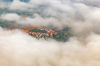 Village hidden under clouds from the east in the district Billigheim in Billigheim-Ingenheim in the state Rhineland-Palatinate, Germany