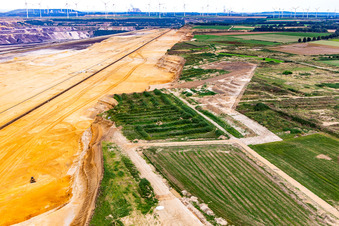 Demolition edge of the Garzweiler open-cast lignite mine in the district Immerath in Erkelenz in the state North Rhine-Westphalia, Germany