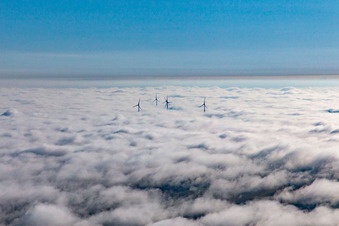 Wind farm at Hatzenbühl in clouds in Hatzenbühl in the state Rhineland-Palatinate, Germany