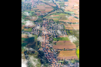 Aerial photograpy of Village with clouds from the east in Freckenfeld in the state Rhineland-Palatinate, Germany