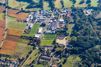 Industriestraße with TSV Fortuna football field in Billigheim-Ingenheim in the state Rhineland-Palatinate, Germany