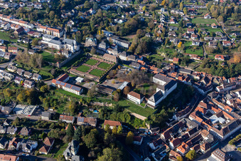 St. Anna and St. Philipp (castle church), orangery and baroque castle above the city in Blieskastel in the state Saarland, Germany out of the air