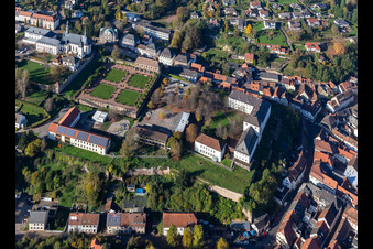 St. Anna and St. Philipp (castle church), orangery and baroque castle above the city in Blieskastel in the state Saarland, Germany from the plane