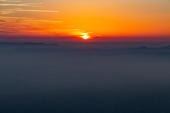 Sunset over the Northern Vosges and the Palatinate Forest in Wissembourg in the state Bas-Rhin, France from above