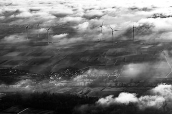 Freckenfeld wind farm at the edge of the clouds in Hergersweiler in the state Rhineland-Palatinate, Germany