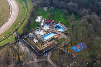 Aerial view of Herxheim forest outdoor pool without water in the pools in winter in Herxheim bei Landau in the state Rhineland-Palatinate, Germany