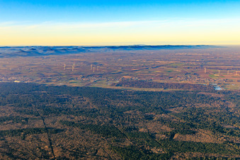 Wind farms and Minfeld in winter in Freckenfeld in the state Rhineland-Palatinate, Germany