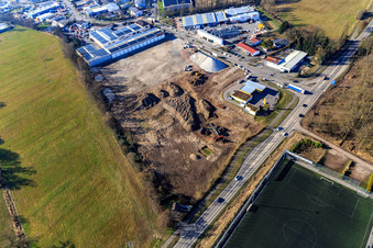 Oblique view of Construction site for the development of the new logistics park of HANSAINVEST and DFI-Real-Estate Kandel after demolition of the OBI market in the district Minderslachen in Kandel in the state Rhineland-Palatinate, Germany