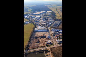Construction site for the development of the new logistics park of HANSAINVEST and DFI-Real-Estate Kandel after demolition of the OBI market in the district Minderslachen in Kandel in the state Rhineland-Palatinate, Germany from the drone perspective