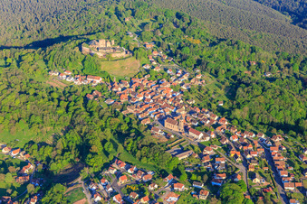 View of the village in the Northern Vosges from the northwest with the church of Notre-Dame-Marie-Auxilliatrice below the Château de Lichtenberg in Lichtenberg in the state Bas-Rhin, France