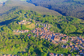 Aerial view of View of the village in the Northern Vosges from the northwest with the church of Notre-Dame-Marie-Auxilliatrice below the Château de Lichtenberg in Lichtenberg in the state Bas-Rhin, France