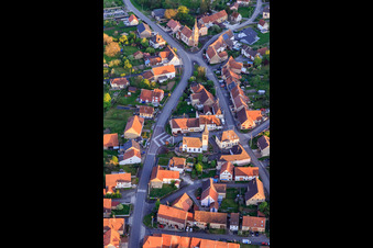 Two churches in the village center from the north in Vœllerdingen in the state Bas-Rhin, France