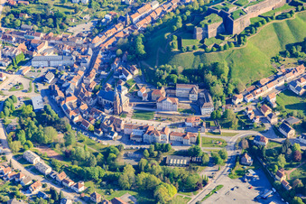 Town center with town hall and church in Bitsch in the state Moselle, France