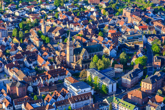 St. Martin's Church behind the Main-Tauber District Office with the Liebliches Taubertal Tourism Association in Tauberbischofsheim in the state Baden-Wuerttemberg, Germany