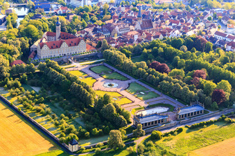 Aerial photograpy of Castle and castle garden Weikersheim (Castle of Count Wolfgang von Hohenlohe from the 17th century with a magnificent knights' hall and garden with statues.) in Weikersheim in the state Baden-Wuerttemberg, Germany