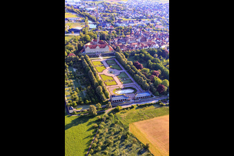 Castle and castle garden Weikersheim (Castle of Count Wolfgang von Hohenlohe from the 17th century with a magnificent knights' hall and garden with statues.) in Weikersheim in the state Baden-Wuerttemberg, Germany from above