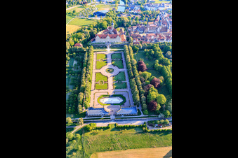 Castle and castle garden Weikersheim (Castle of Count Wolfgang von Hohenlohe from the 17th century with a magnificent knights' hall and garden with statues.) in Weikersheim in the state Baden-Wuerttemberg, Germany seen from above