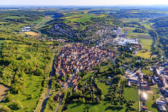 Village overview in the lovely Taubertal from the southwest in the morning in Röttingen in the state Bavaria, Germany