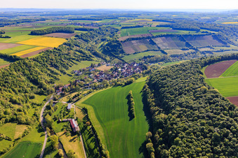 Village overview in the lovely Taubertal with vineyard Tauberzell in the morning from the west in the district Tauberzell in Adelshofen in the state Bavaria, Germany