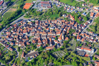 Overview of the town with the Church of St. Peter and Paul in Grünsfeld in the state Baden-Wuerttemberg, Germany